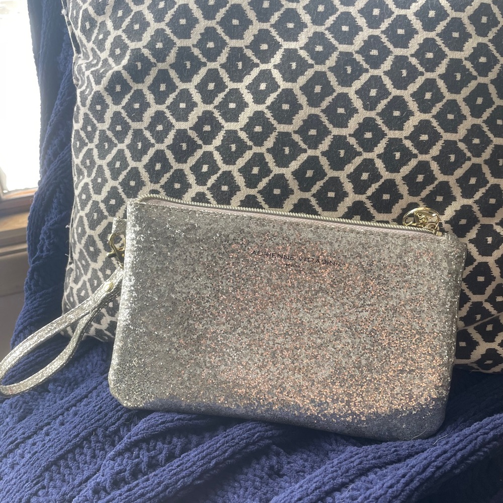 Adrienne vittadini silver wristlet.